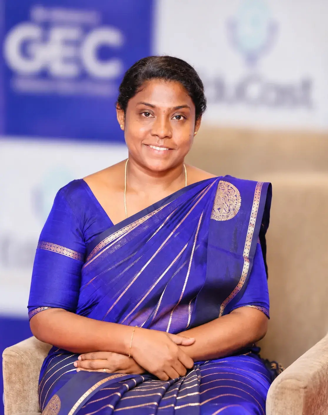 Portrait of Suvvidha Kannan, founder of Williez Preschool, in a blue saree