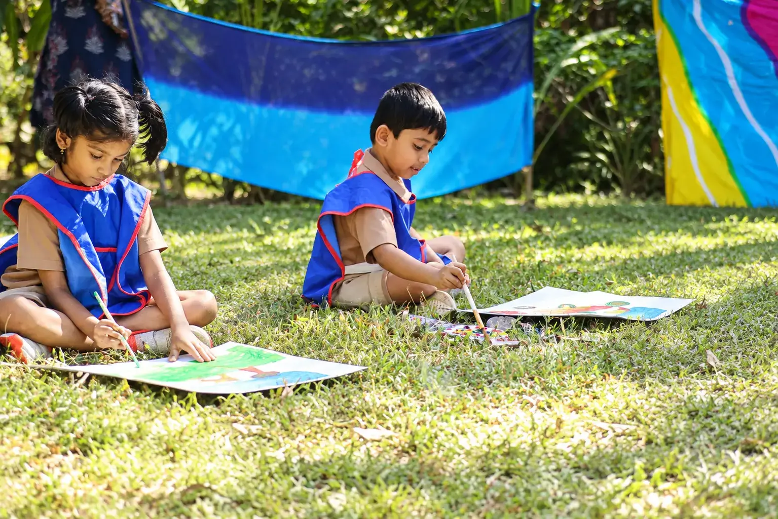 Young Artists Painting in the Garden