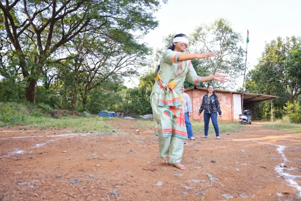 Educator leading a fun outdoor activity at Williez Preschool, India